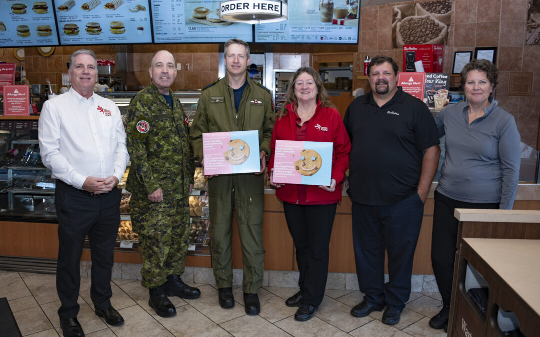 4 Wing members help spread smiles for Smile Cookie campaign